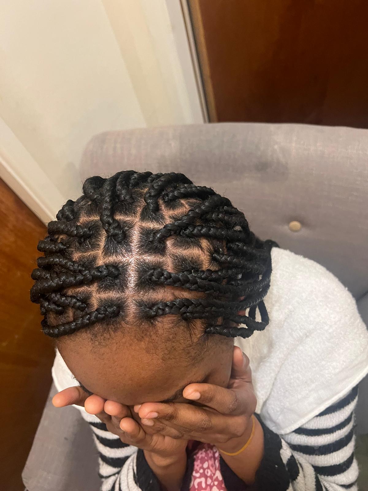 Box braids by Style Deluxe